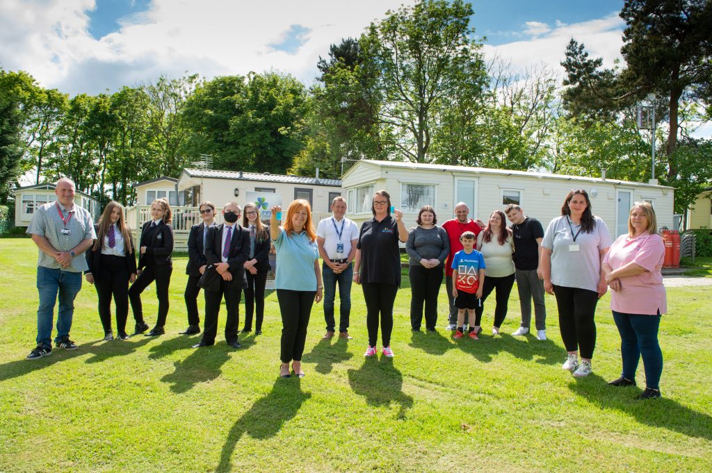 Young carers on Teesside receive keys to two caravans from Frances Connolly a...